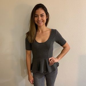 A peplum grey striped shirt